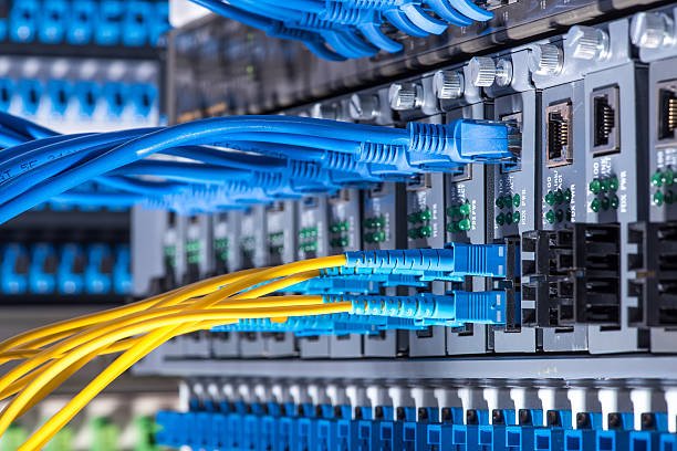 fiber optic cables and utp network cables connected hub ports. fiber optic cables and utp network cables connected hub ports.